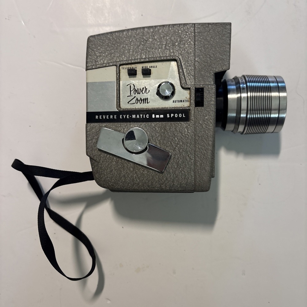 The Revere Model 118D Eye Matic 8mm Movie Camera Power Zoom Telephoto Wide Angle